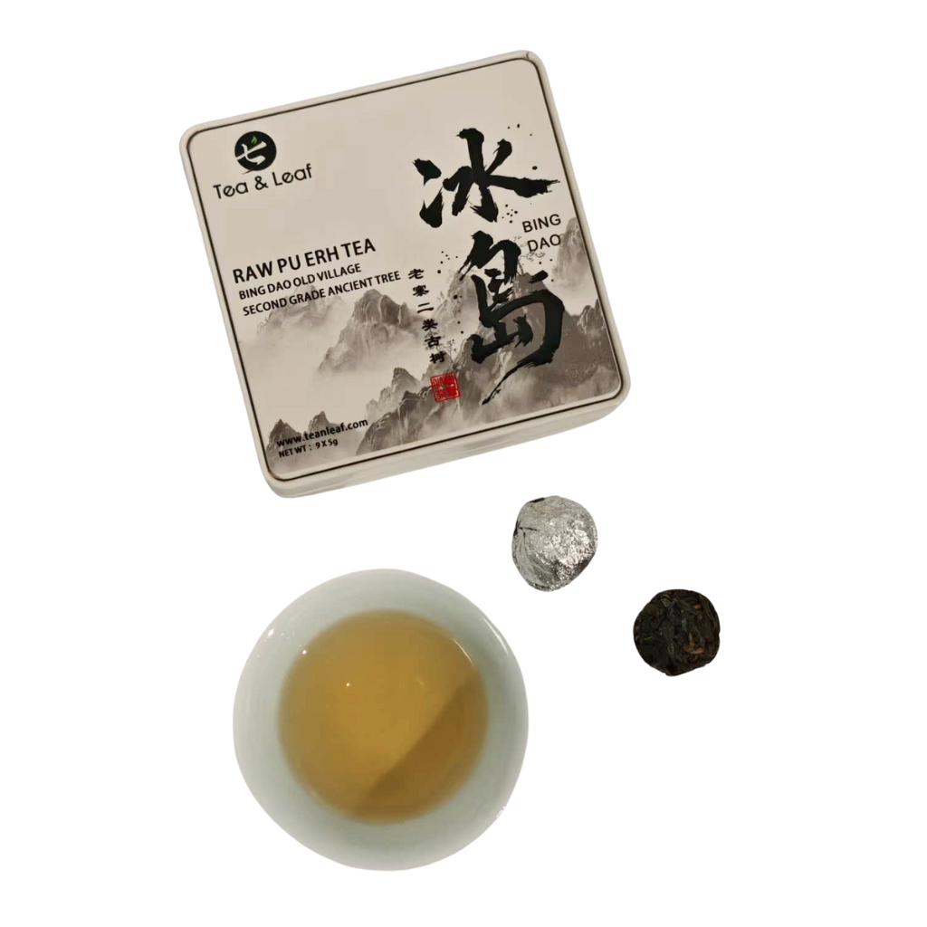 Tea & Leaf 2024 Spring Bingdao Old Village Second Grade Ancient Tree Raw Pu-erh Tea — tin box with 9 × 5g tea balls, brewed golden tea liquor in cup, showcasing floral honey aroma and smooth, sweet Sheng Pu-erh flavor from Yunnan, China.