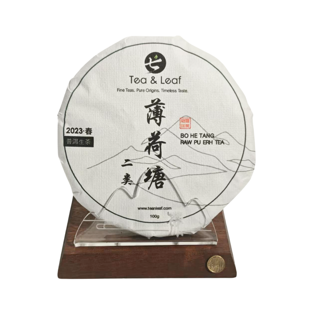 Tea & Leaf 2023 Spring Zhoujia Bohetang Second-Grade Ancient Tree Raw Pu-erh Tea 100g cake — Yiwu Mountain Sheng Pu-erh with floral honey aroma, smooth texture, and gentle cooling finish.